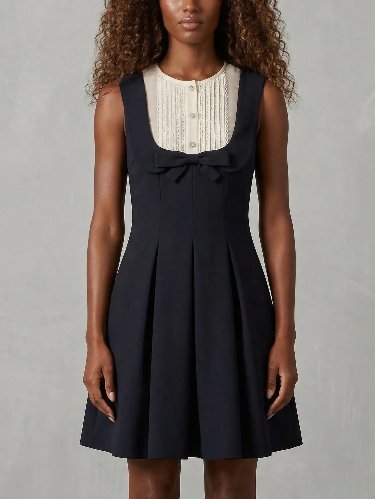Black Sleeveless Mini Dress with Bow and Contrast Bib - Dresses