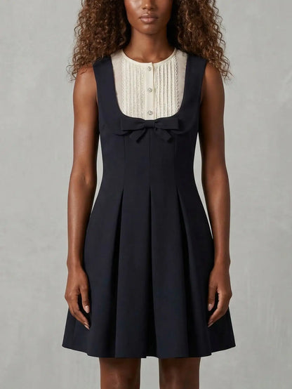 Black Sleeveless Mini Dress with Bow and Contrast Bib - Dresses