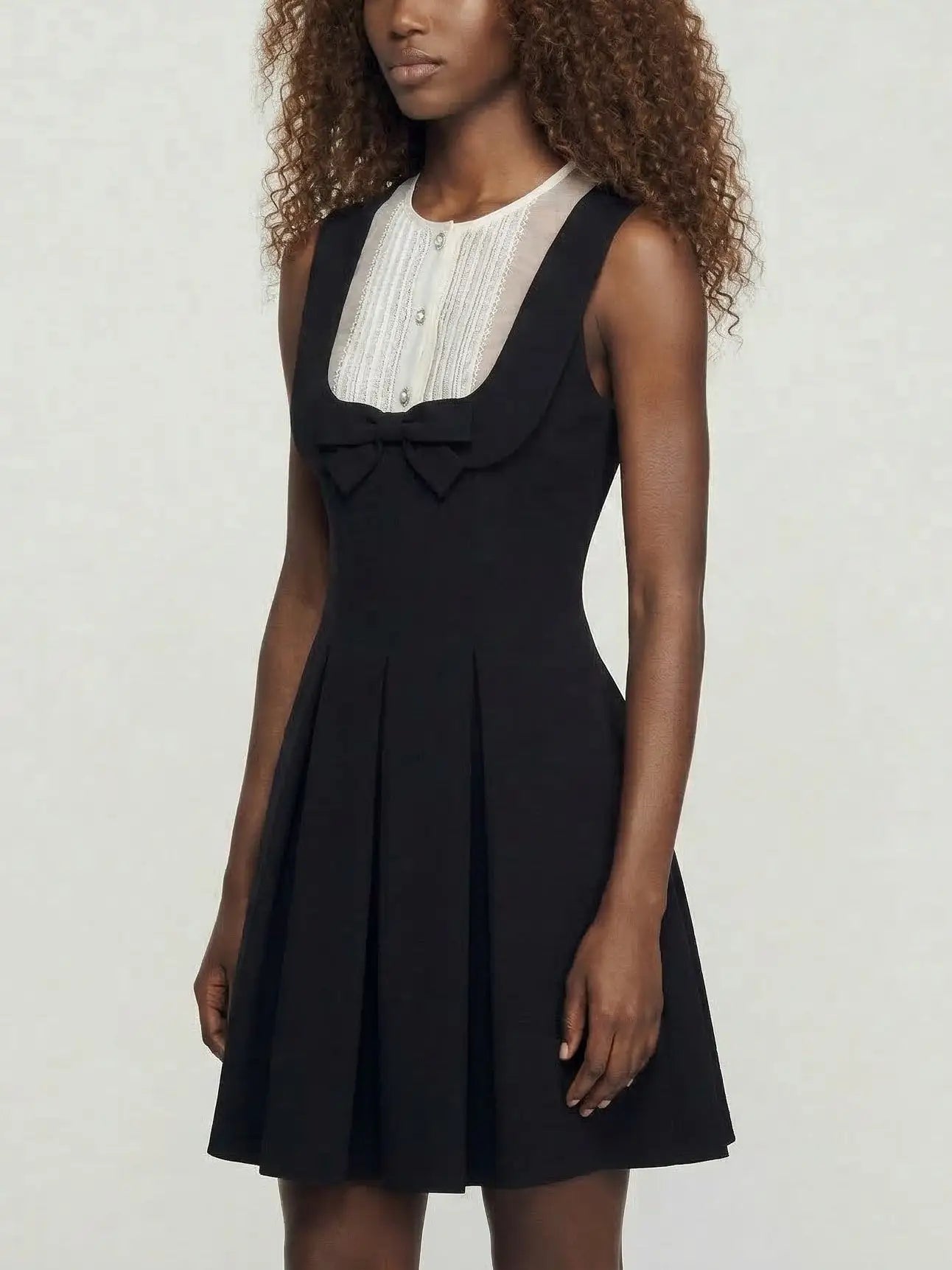 Black Sleeveless Mini Dress with Bow and Contrast Bib - Dresses