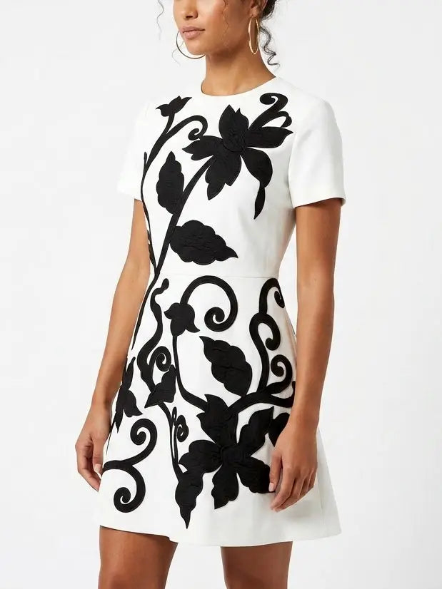 White Mini Dress with Black Floral Embroidery - Dresses