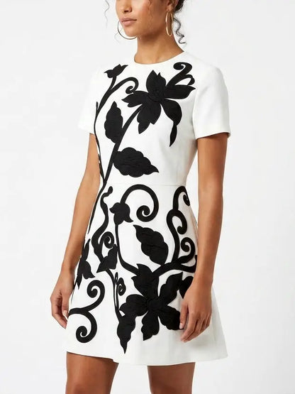 White Mini Dress with Black Floral Embroidery - Dresses
