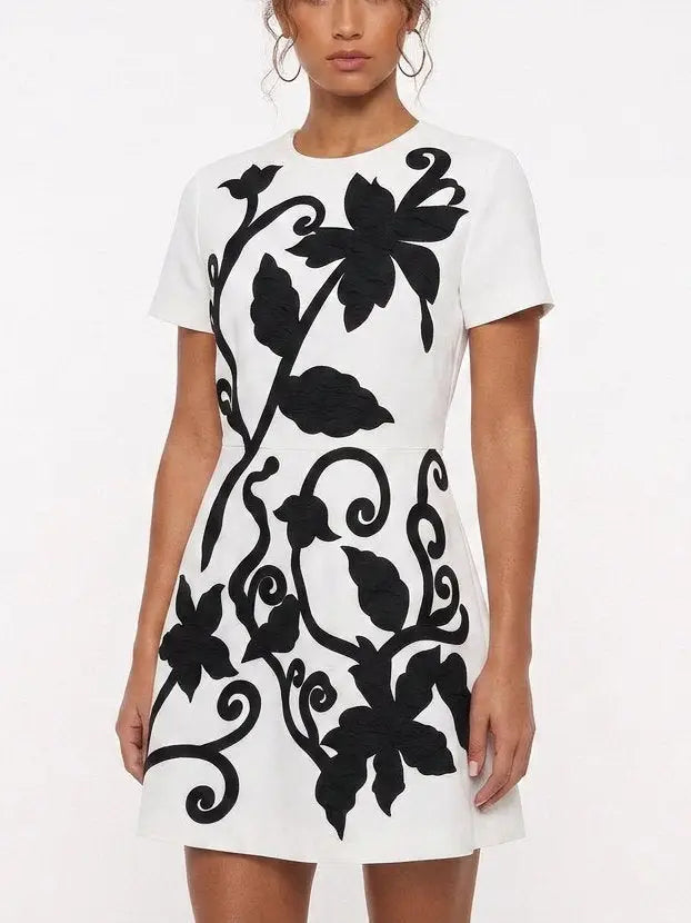 White Mini Dress with Black Floral Embroidery - Dresses
