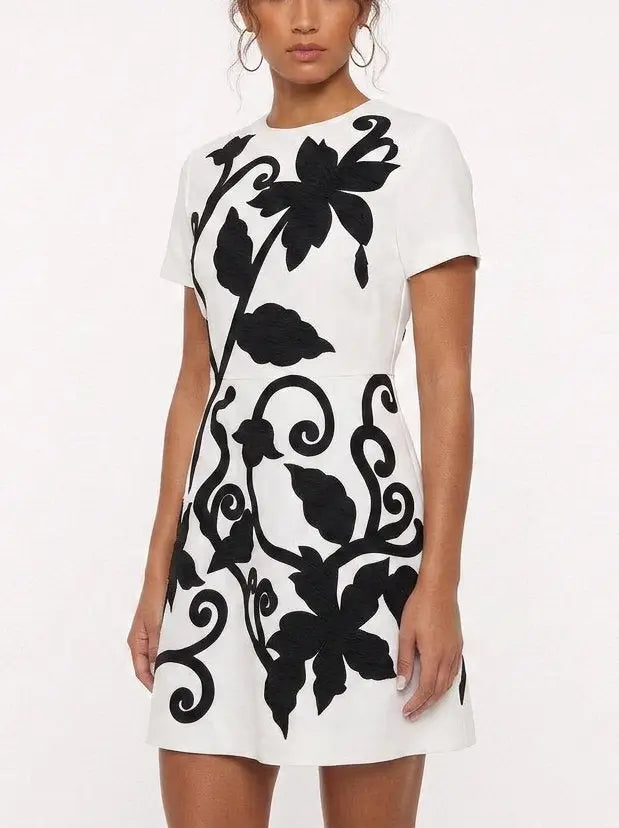 White Mini Dress with Black Floral Embroidery - Dresses