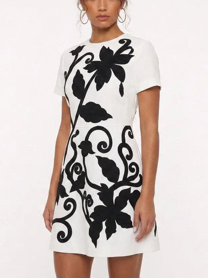White Mini Dress with Black Floral Embroidery - Dresses