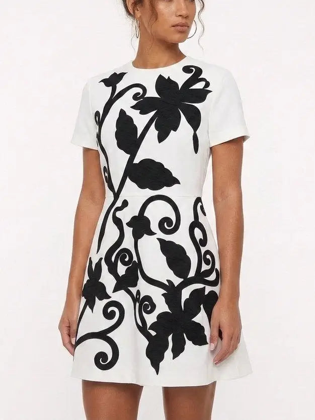 White Mini Dress with Black Floral Embroidery - Dresses