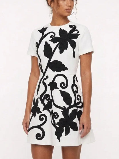 White Mini Dress with Black Floral Embroidery - Dresses
