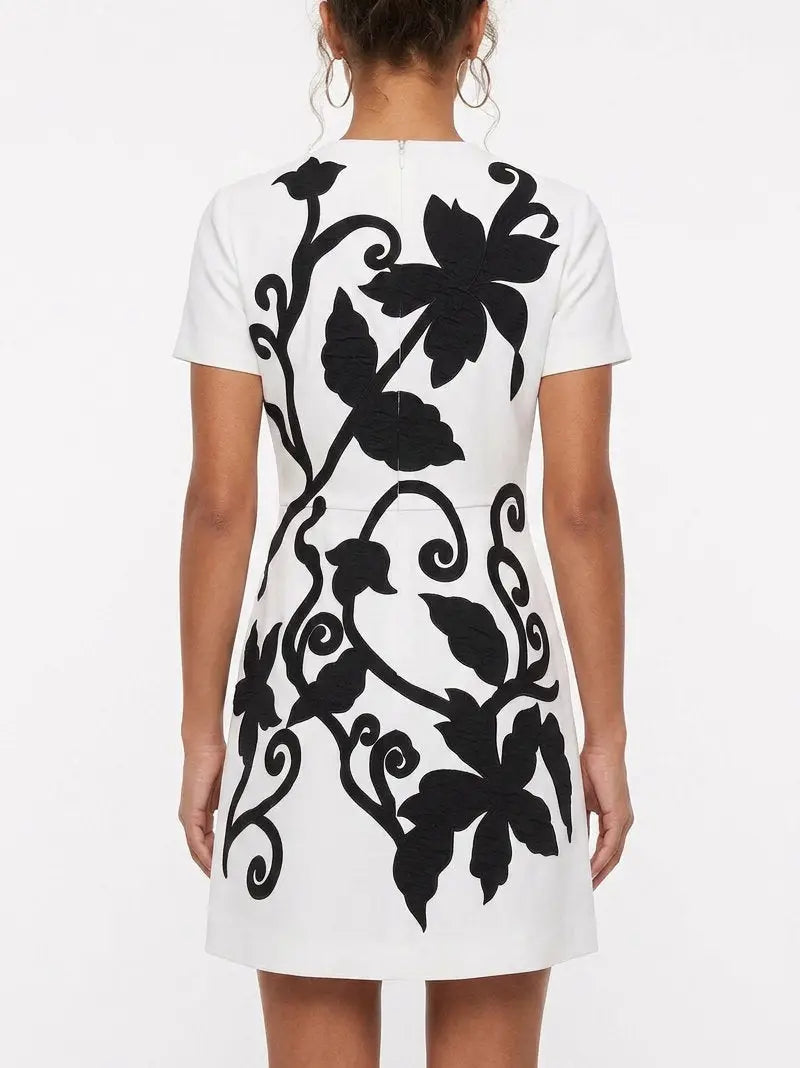 White Mini Dress with Black Floral Embroidery - Dresses