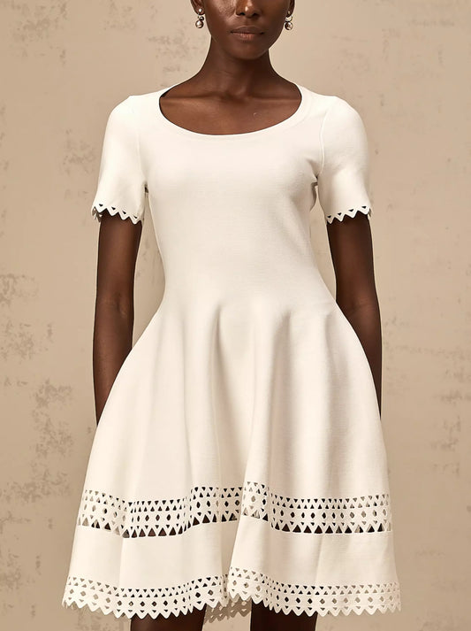 White A-Line Cut-Out Stretch Knit Mini Dress with scalloped trim for a chic look