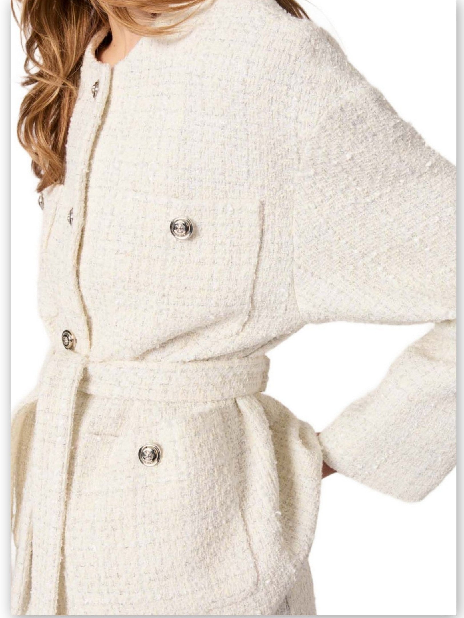 Cream-colored tweed jacket with belt from Branna Couture in luxury women’s apparel