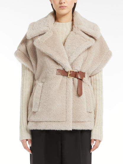 Beige faux fur vest with brown belt, perfect for the Belted Wool Teddy Gilet in Sand