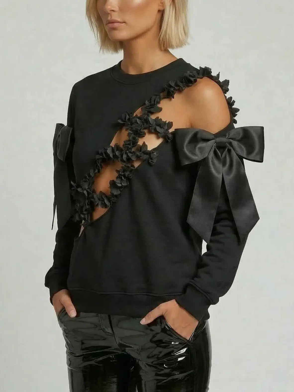 Black Cutout Sweatshirt with Bow and Floral Detail - Tops