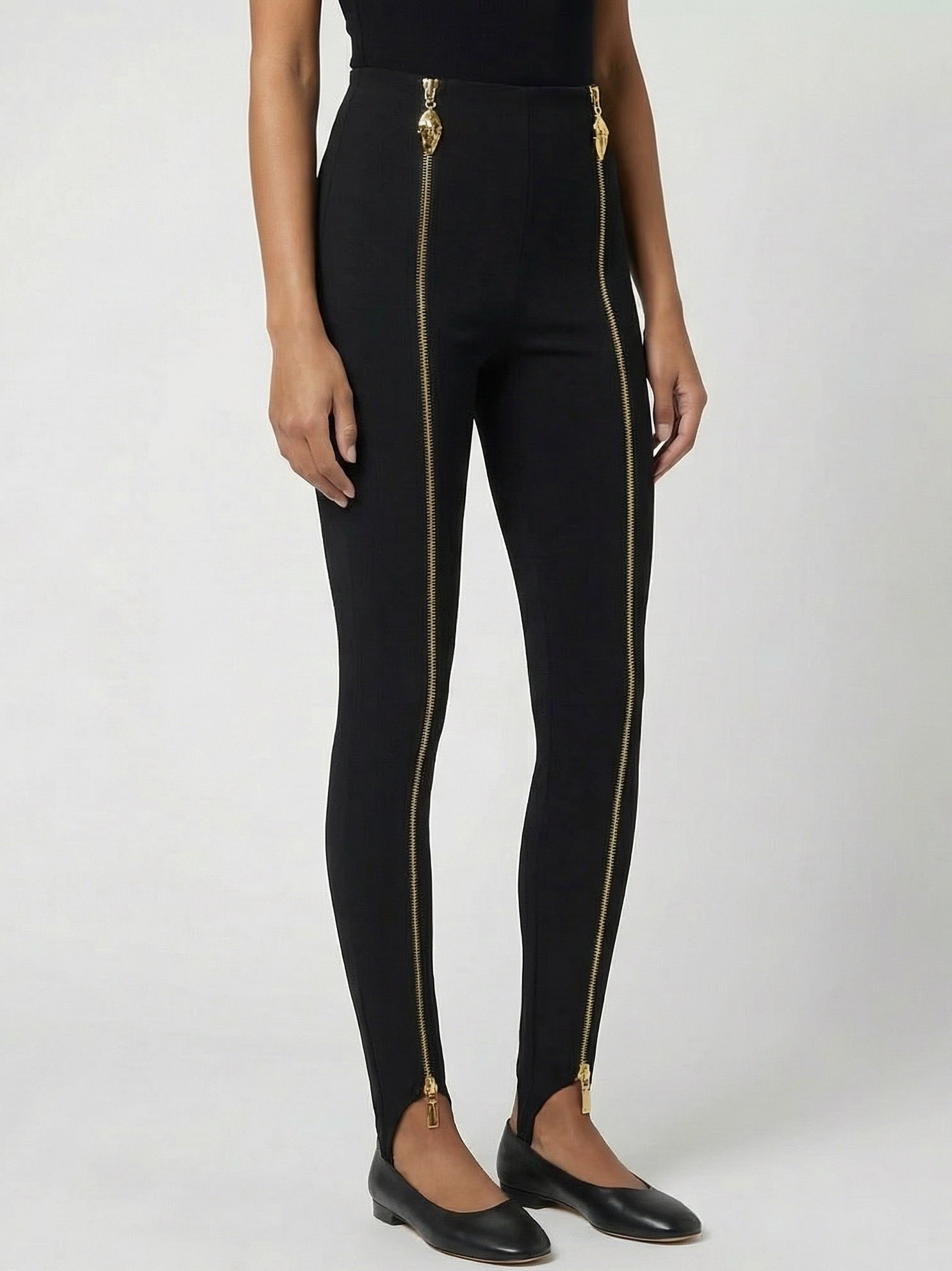 Black Stretch Stirrup Pants with Gold Zip Details - Jeans & Pants
