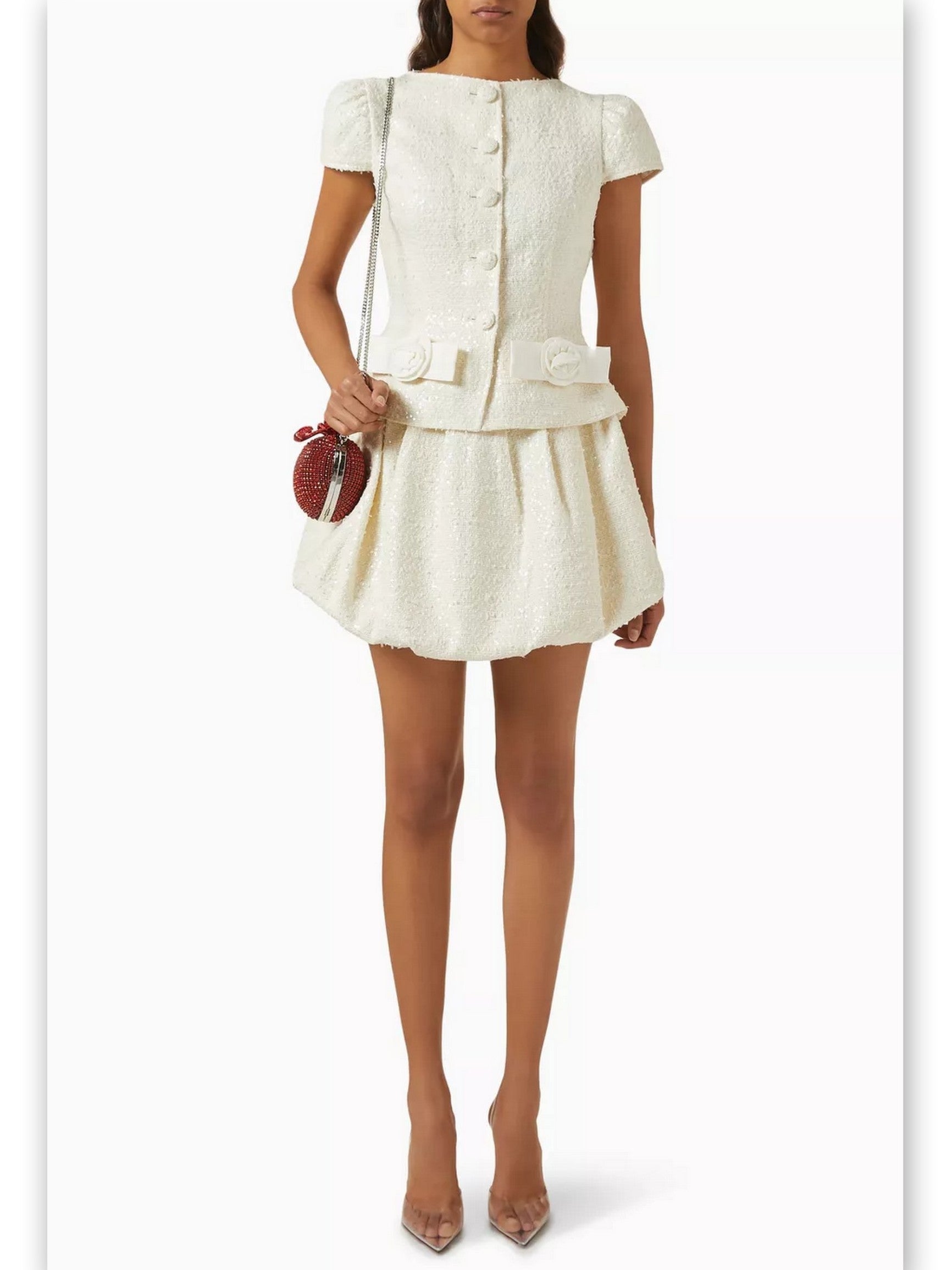 Bouclé tweed mini dress featuring rose and bow detail in stylish white tweed