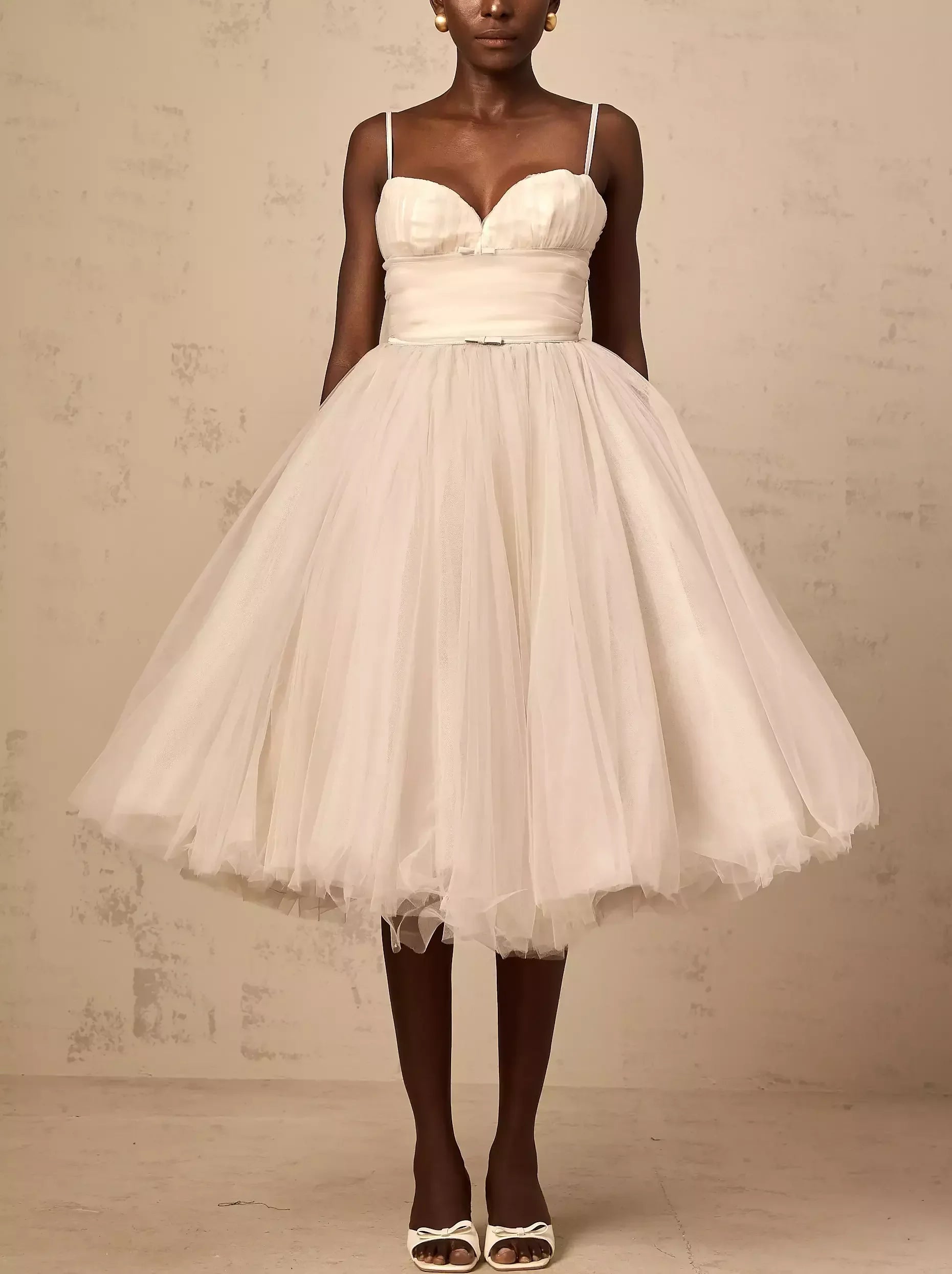 White Bow-Detail Sleeveless Tulle Flared Midi Dress perfect for elegant occasions