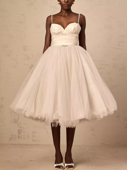 White Bow-Detail Sleeveless Tulle Flared Midi Dress perfect for elegant occasions