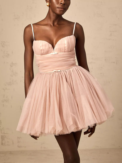 Bow-Detail Sleeveless Tulle Flared Mini Dress in pink showcasing chic style and elegance