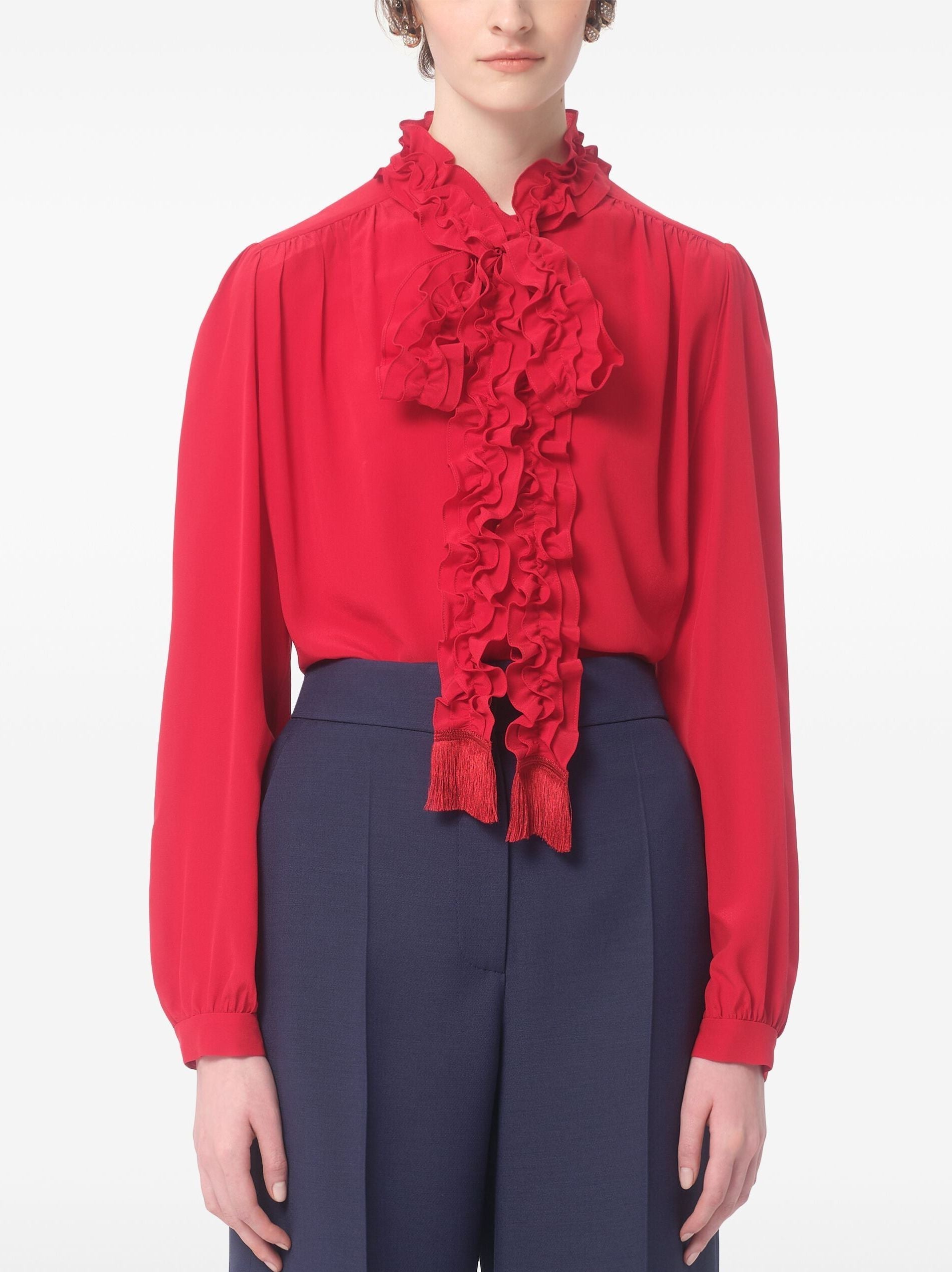 Bright Red Ruffled Collar Fringed Tie-Neck Shirt styled with navy pants for a chic look