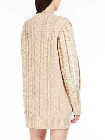 Beige cable-knit sequin-paneled oversize sweater featuring elegant gold accents