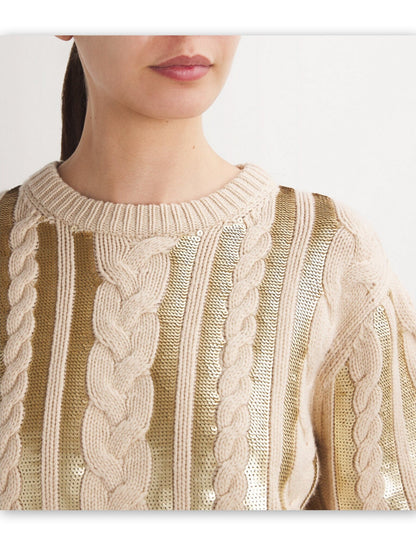 Beige cable-knit sequin-paneled oversize sweater featuring elegant gold accents