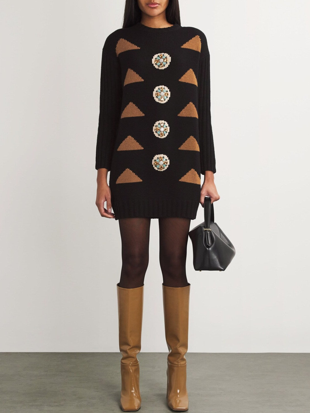 Black knit dress with geometric patterns from a cashmere embellished oversized knit collection