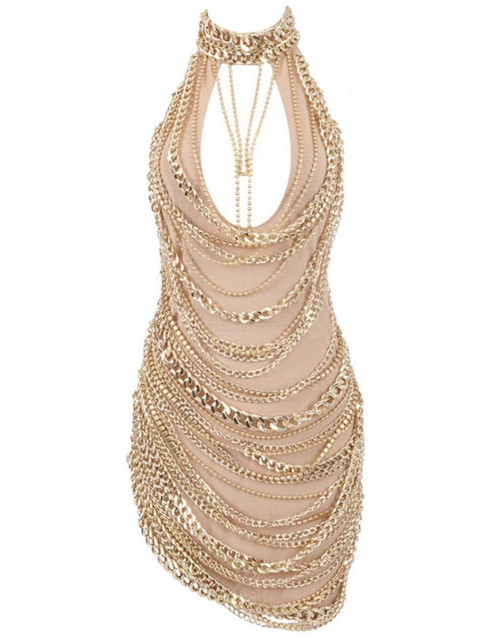 Gold chain halter dress in nude, featuring a chain-embellished high-neck mini design