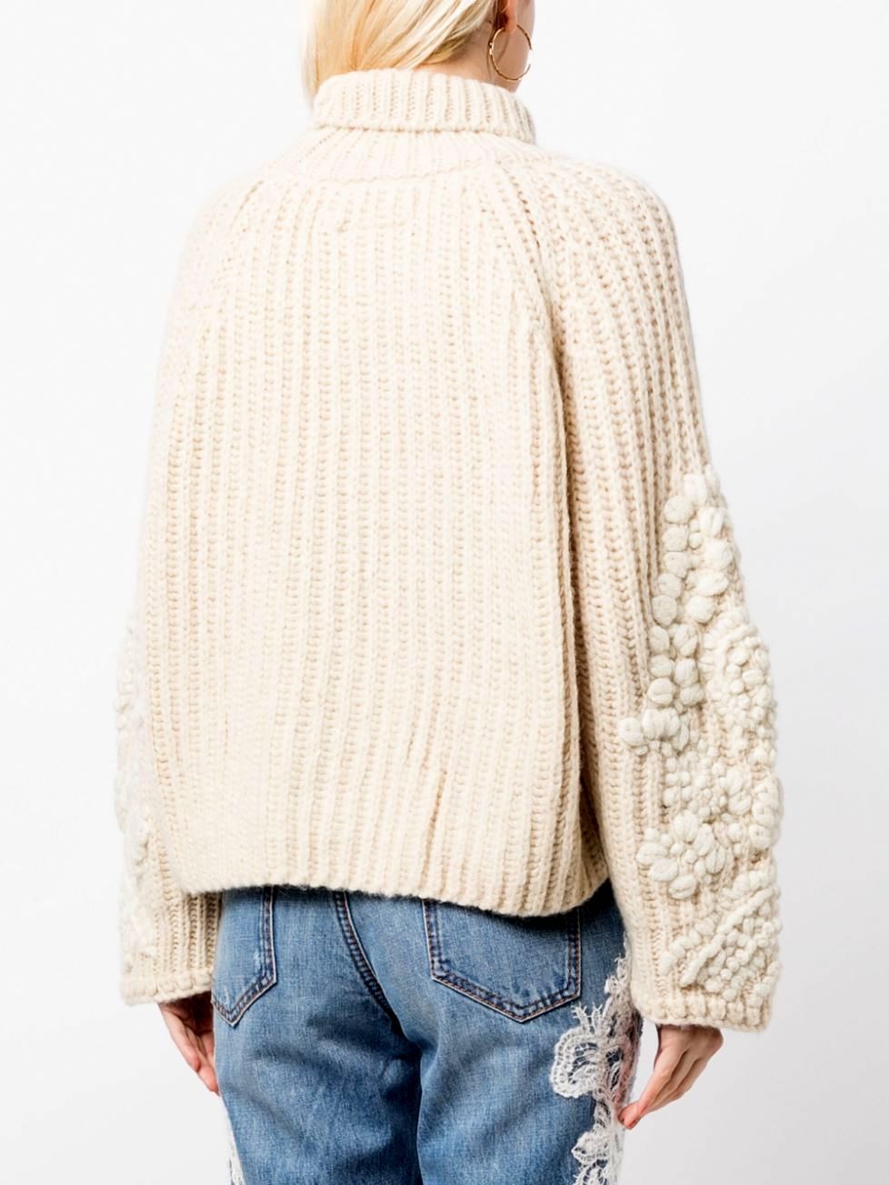 Chunky Embroidered Knit Turtleneck Sweater in cozy textured yarn for stylish layering