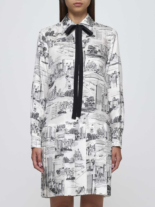 City-Print Silk Mini Dress with Neck Tie featuring a stylish city design on white fabric