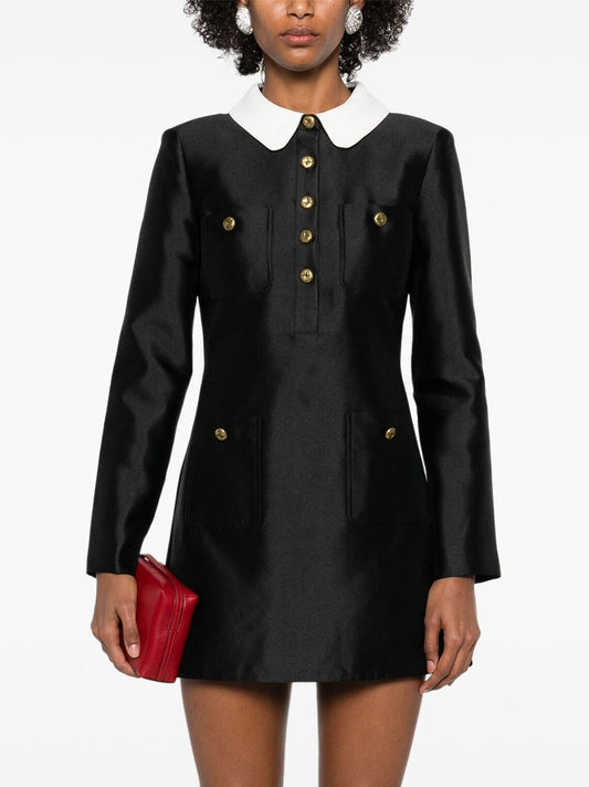 Black mini dress with white collar and gold buttons, perfect for contrast-collar patch-pocket style