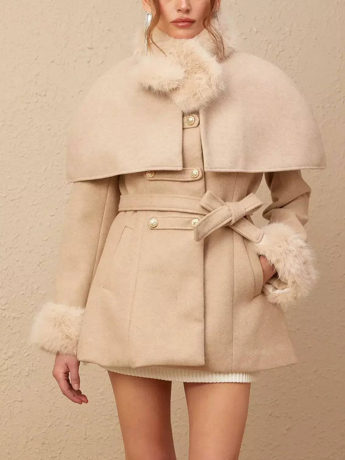 Beige detachable faux-fur cape coat featuring luxurious fur trim for versatile style