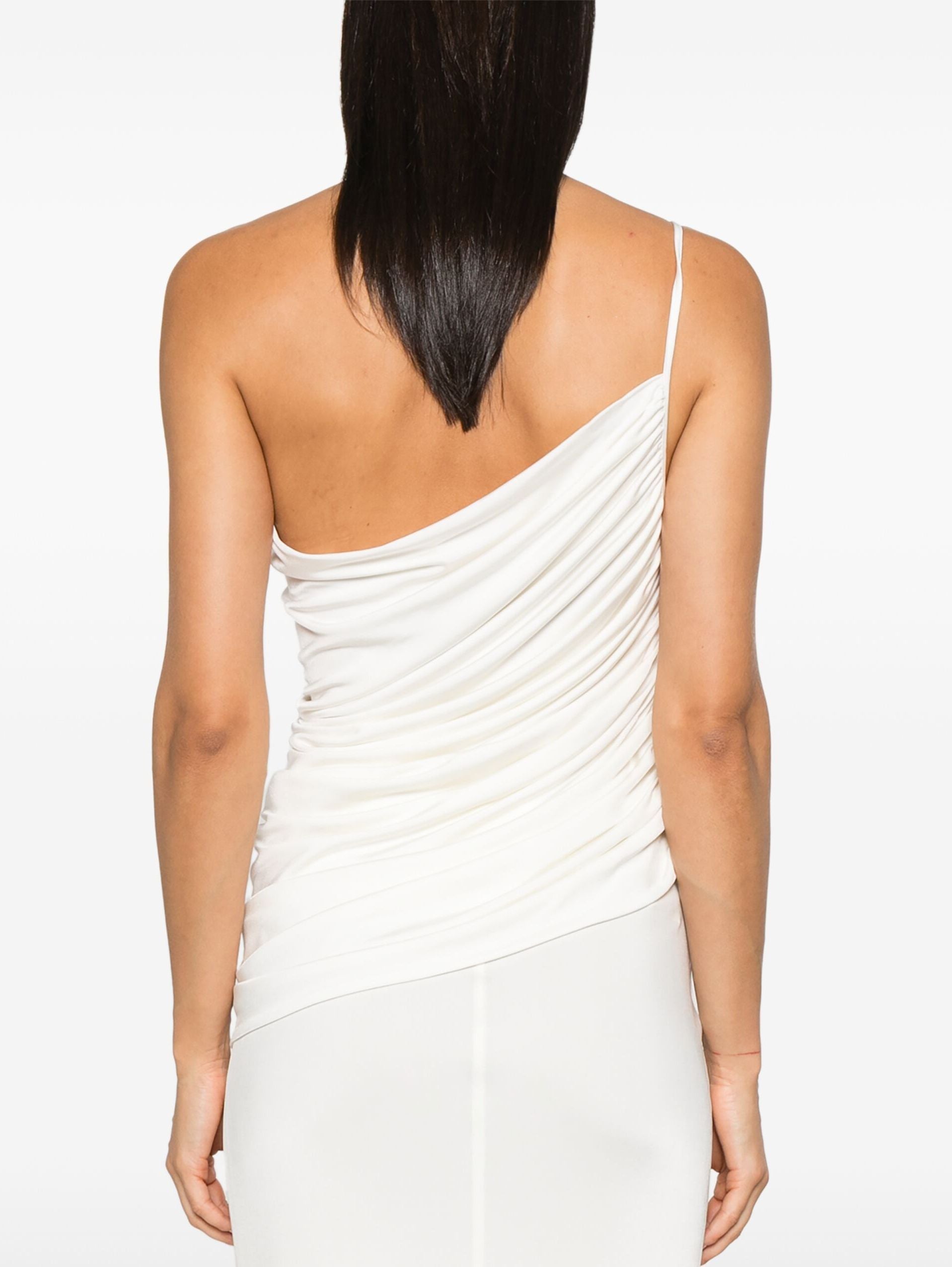 White one-shoulder draped jersey top featuring a detachable rose brooch accessory
