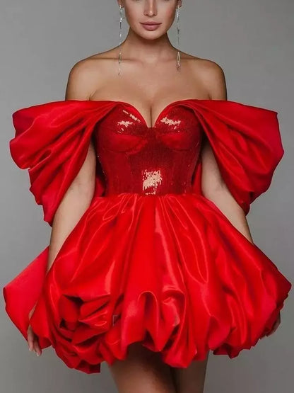 Draped off-the-shoulder red sequin dress by Branna Couture, fit and flared style