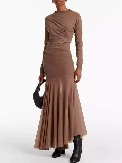 Taupe long-sleeved jersey mesh dress featuring a pleated skirt design