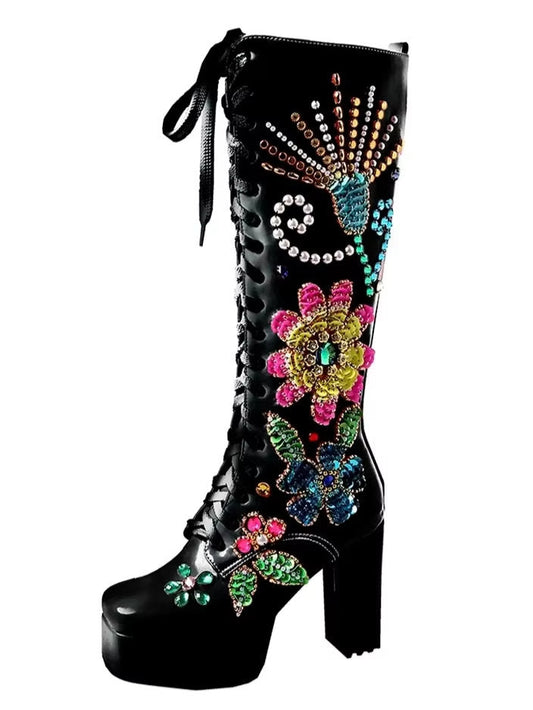 Black embellished lace-up leather platform boots with floral embellishments