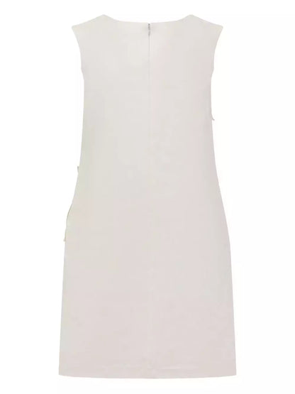 Sleeveless floral-applique cream crepe mini shift dress elegantly displayed on a model