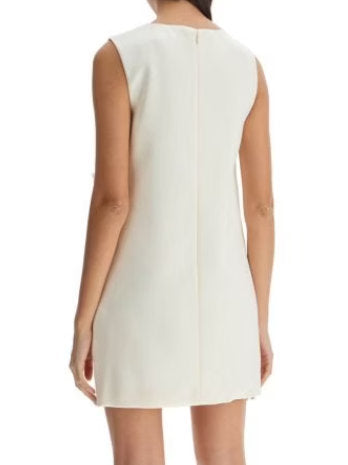 Sleeveless floral-applique cream crepe mini shift dress showcased in elegant design