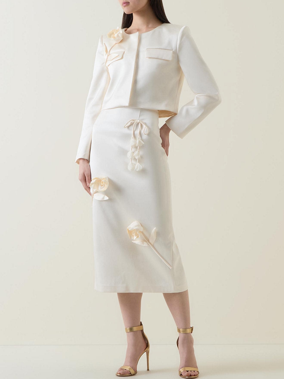 Ivory skirt suit featuring a Floral-Applique Cream Jacket with Concealed Button Placket