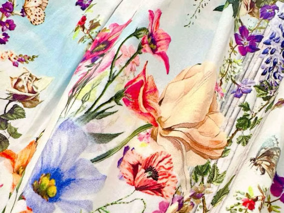 Halter-neck multicolored floral printed mini dress with vibrant floral-patterned fabric