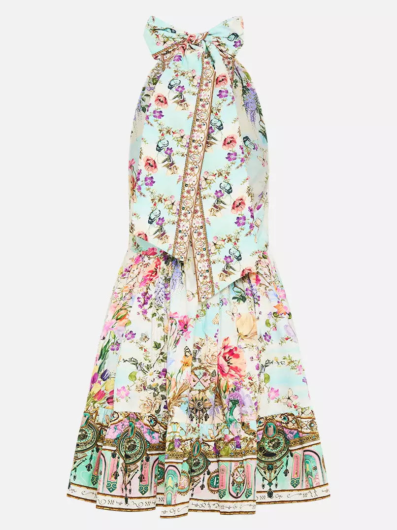 Halter-neck multicolored floral printed mini dress on display with vibrant patterns