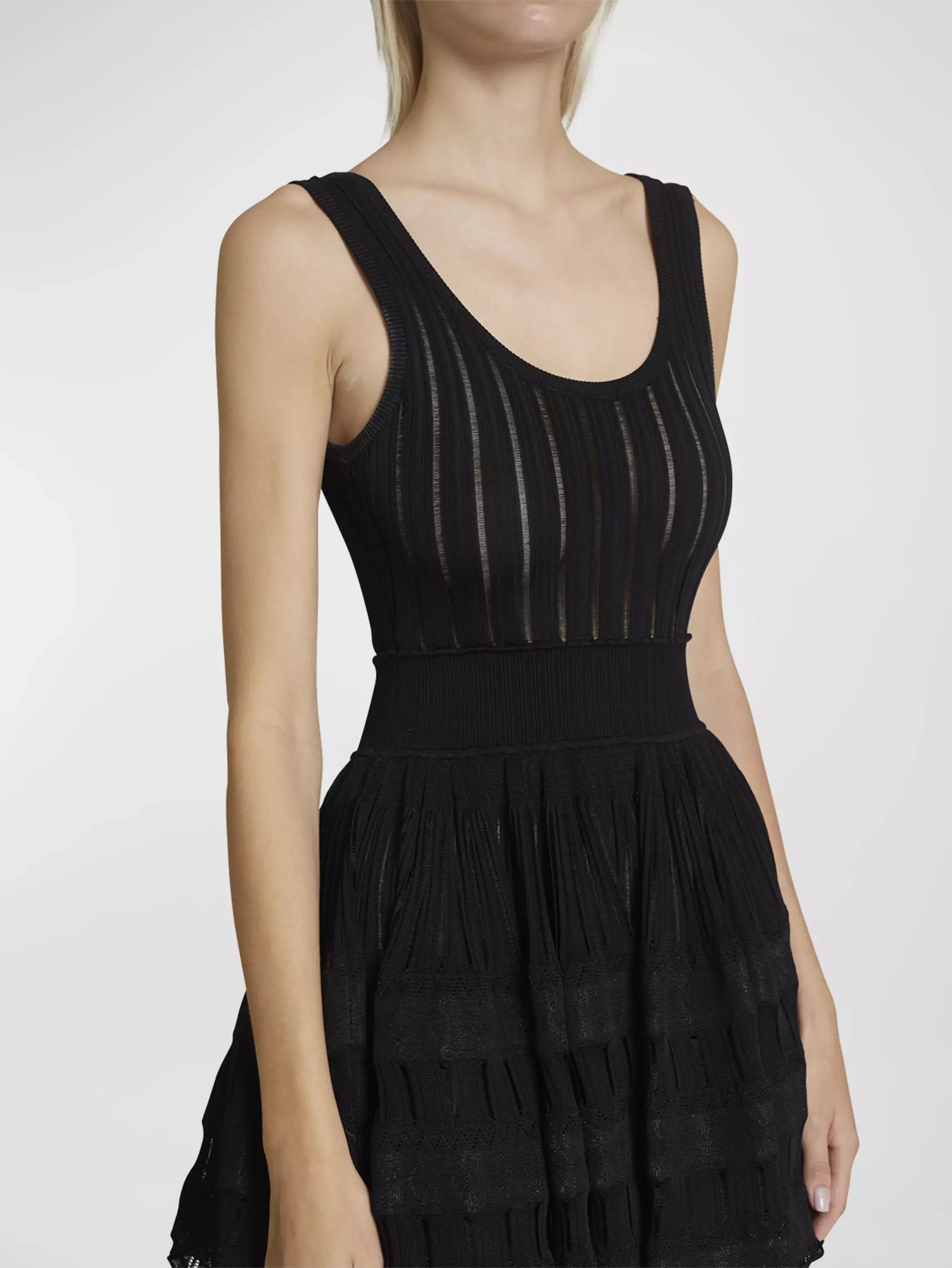 Sleeveless black knit fit and flare skater tank dress for a stylish look