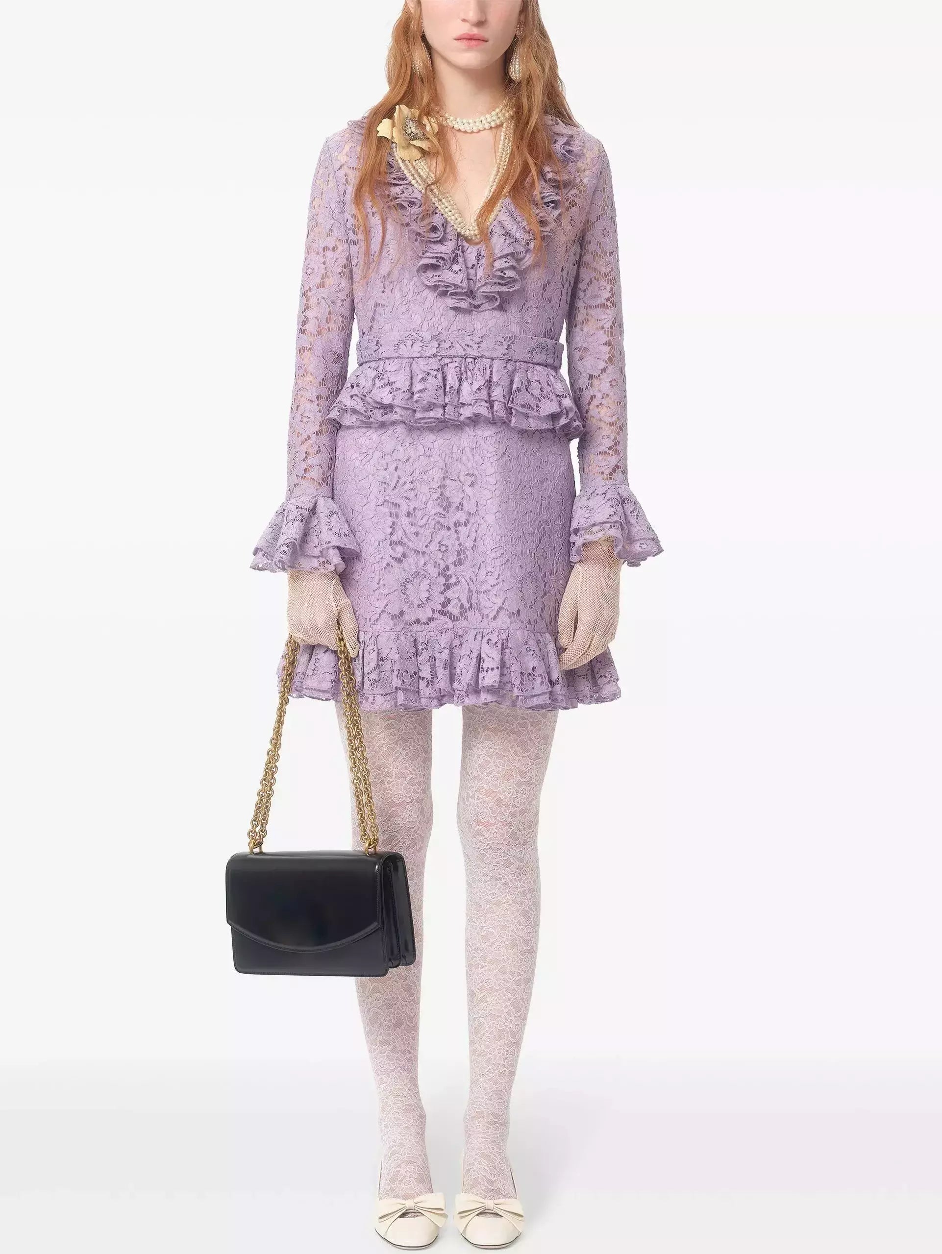 Lavender lace ruffle dress showcasing a Lilac Ruffled V-Neck Peplum Lace Mini Dress