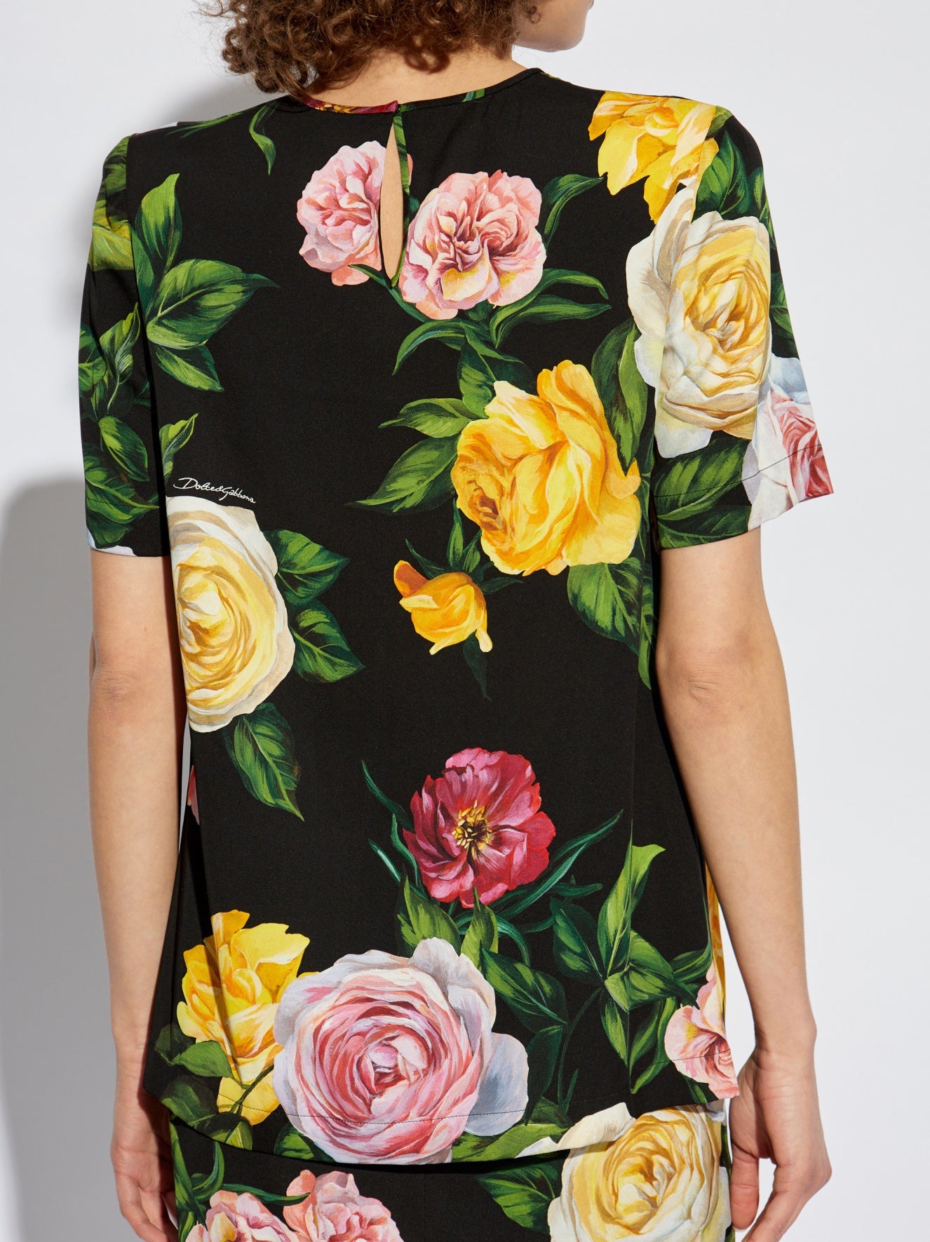 Floral-patterned blouse featuring a Multicolored Rose Print Silk T-Shirt in Black