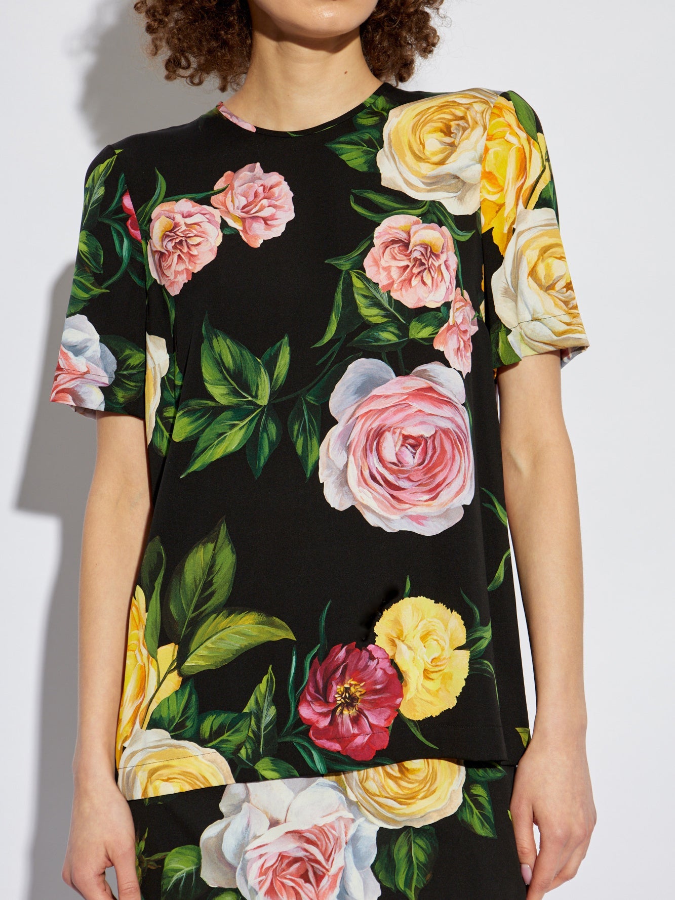 Multicolored Rose Print Silk T-Shirt in Black with vibrant floral design