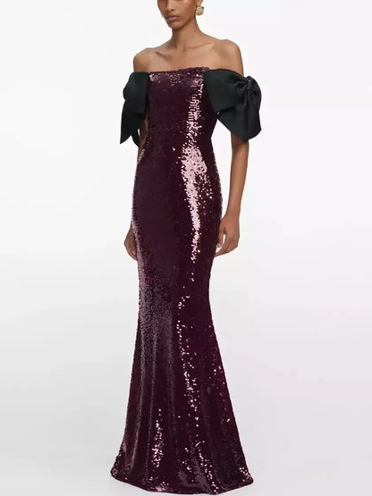 Off-Shoulder Sequin Gown with Black Bow Accents - Dresses