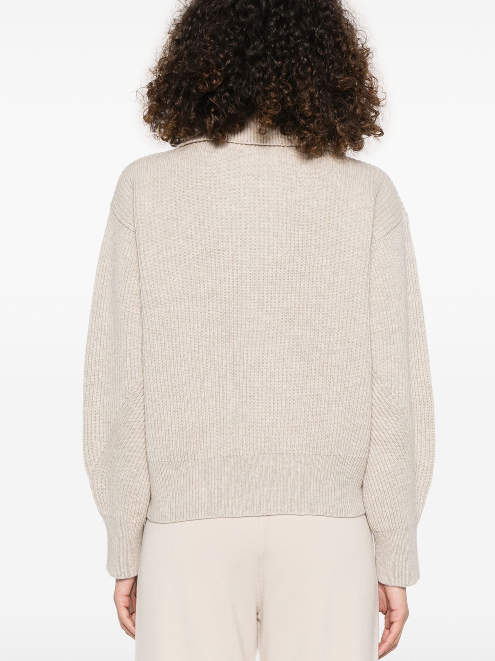 Beige Ribbed Eyelet Lace-Up Knit Sweater showcasing stylish ribbed design