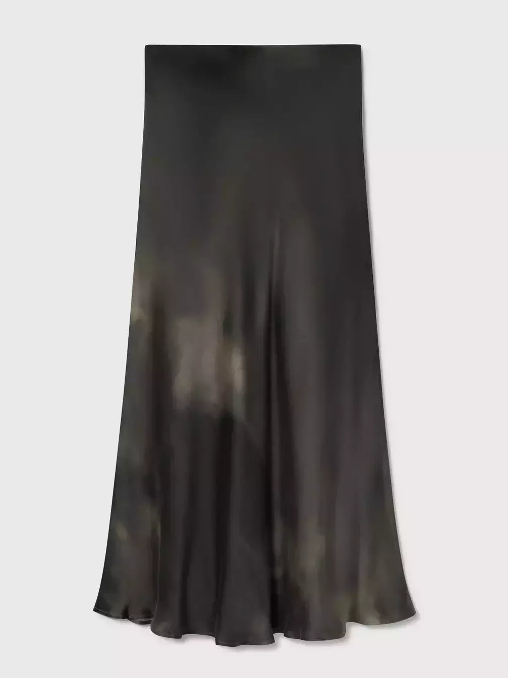 Woman in a black t-shirt and colorful silk sand-washed long skirt, showcasing style