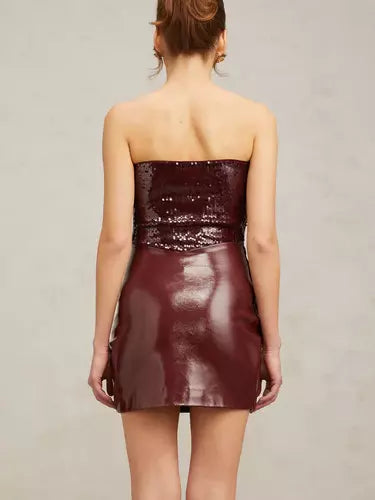 Burgundy strapless sequin mini dress with buckled wrap effect for a chic look