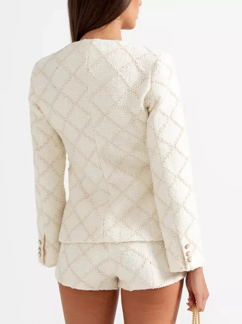Cream-colored textured tweed jacket and matching short set for stylish outfits